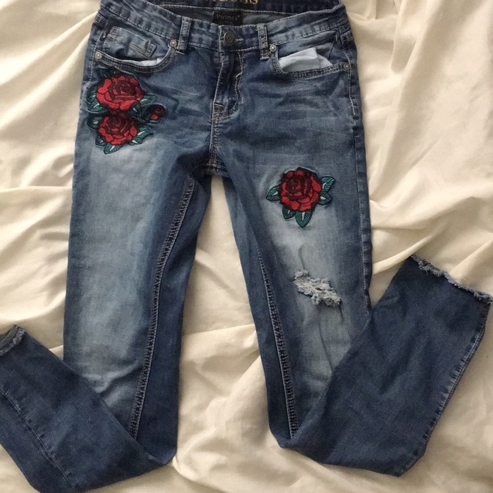 Blue denim ankle skinny jeans with roses